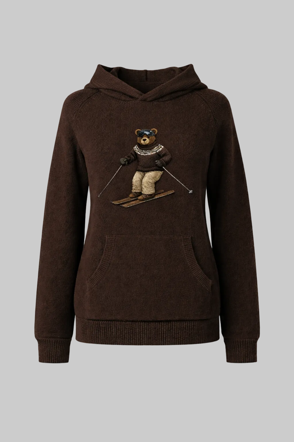Brown hoodie with a teddy bear skiing design on a gray background